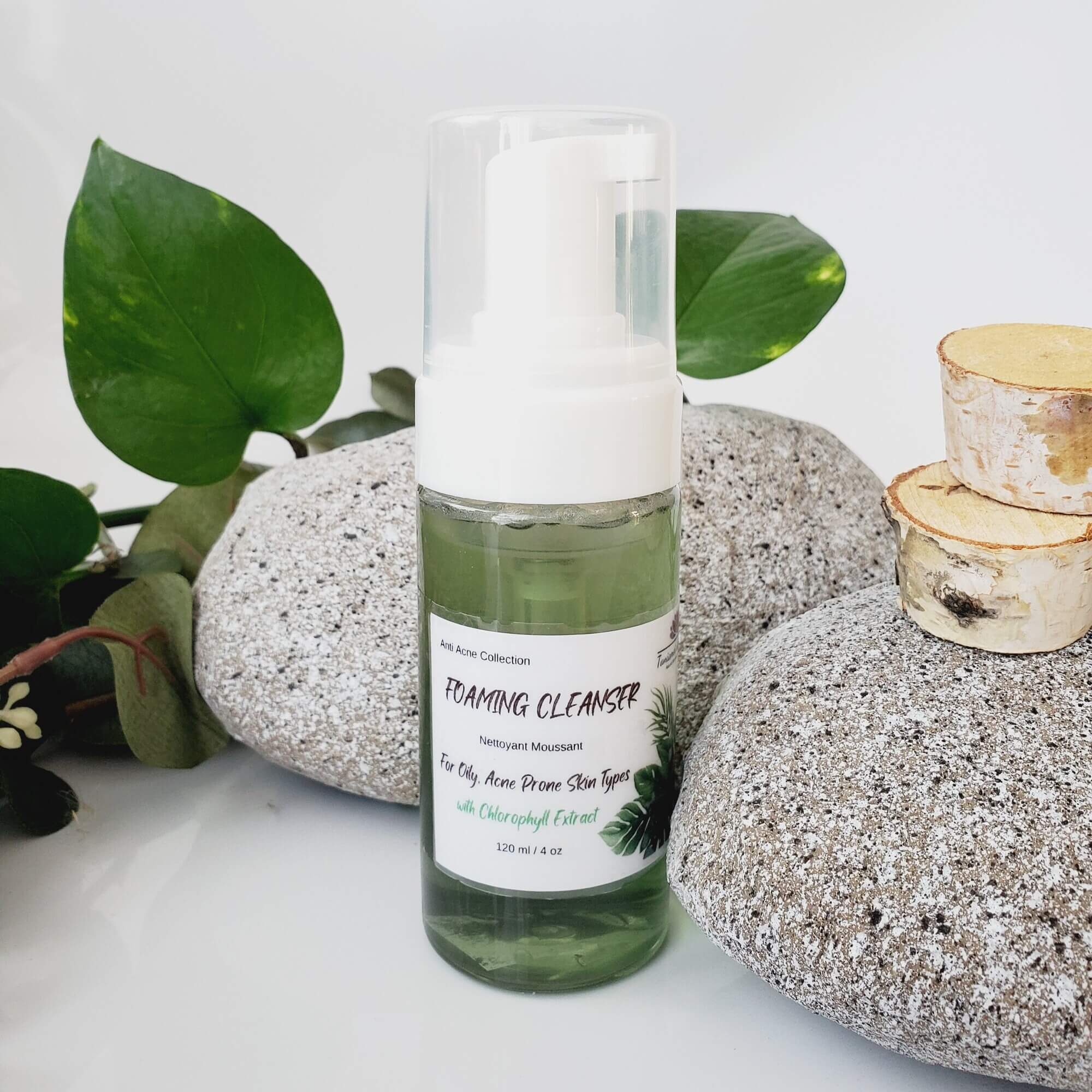 clear foaming bottle with green liquid