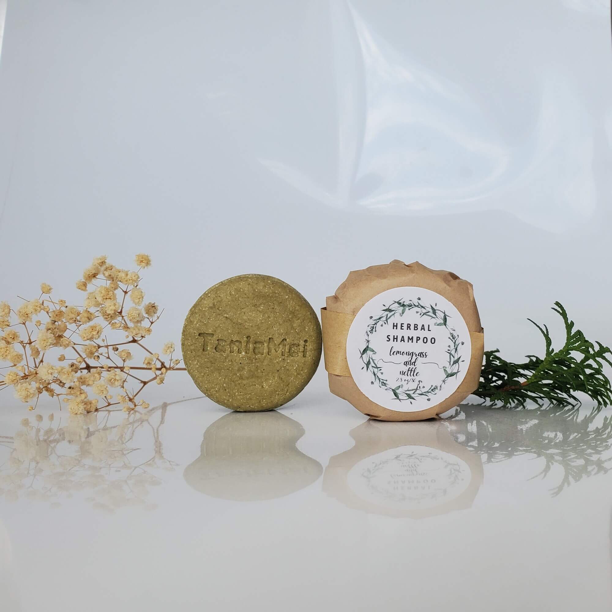 green round shampoo bar with taniamei logo