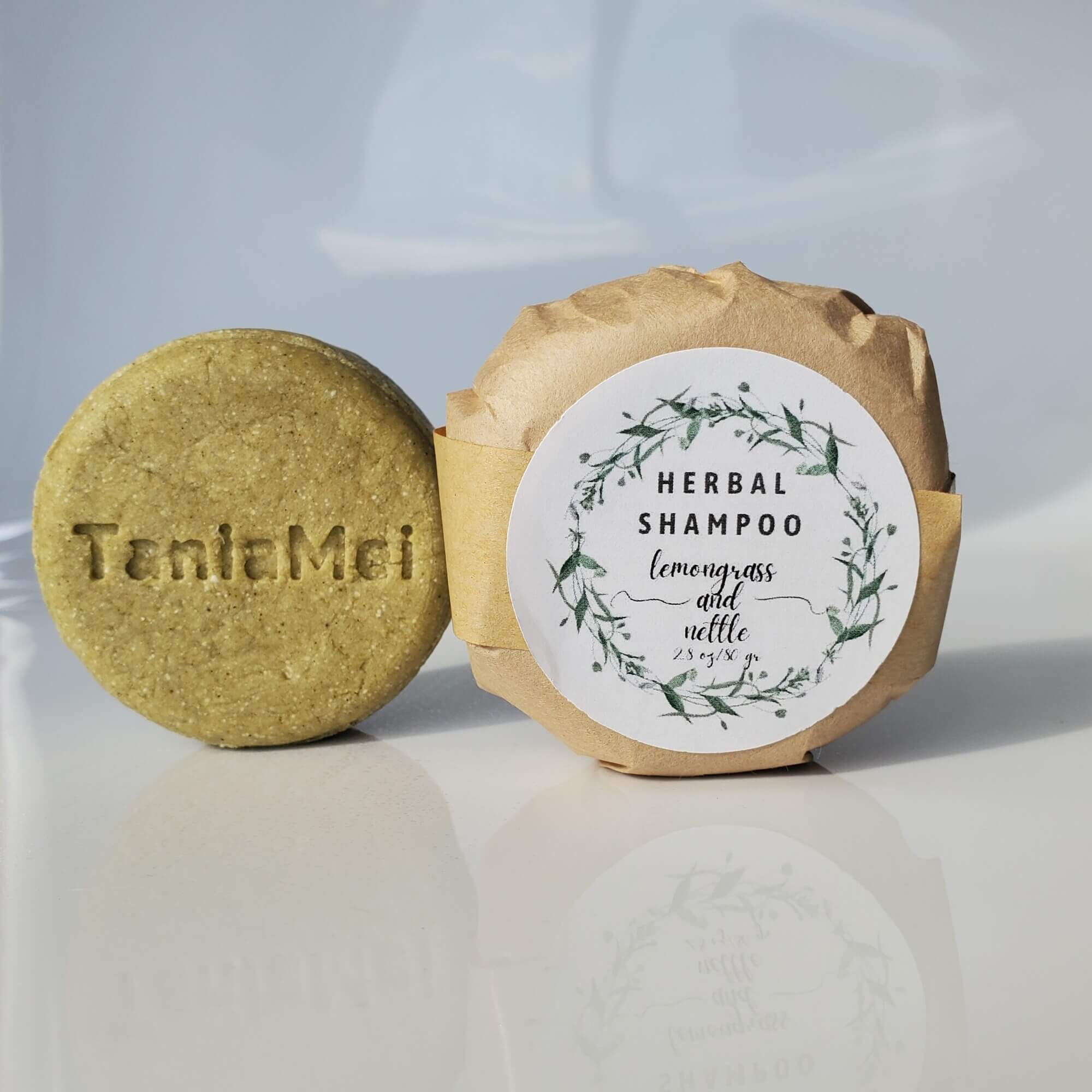 green round shampoo bar with taniamei logo
