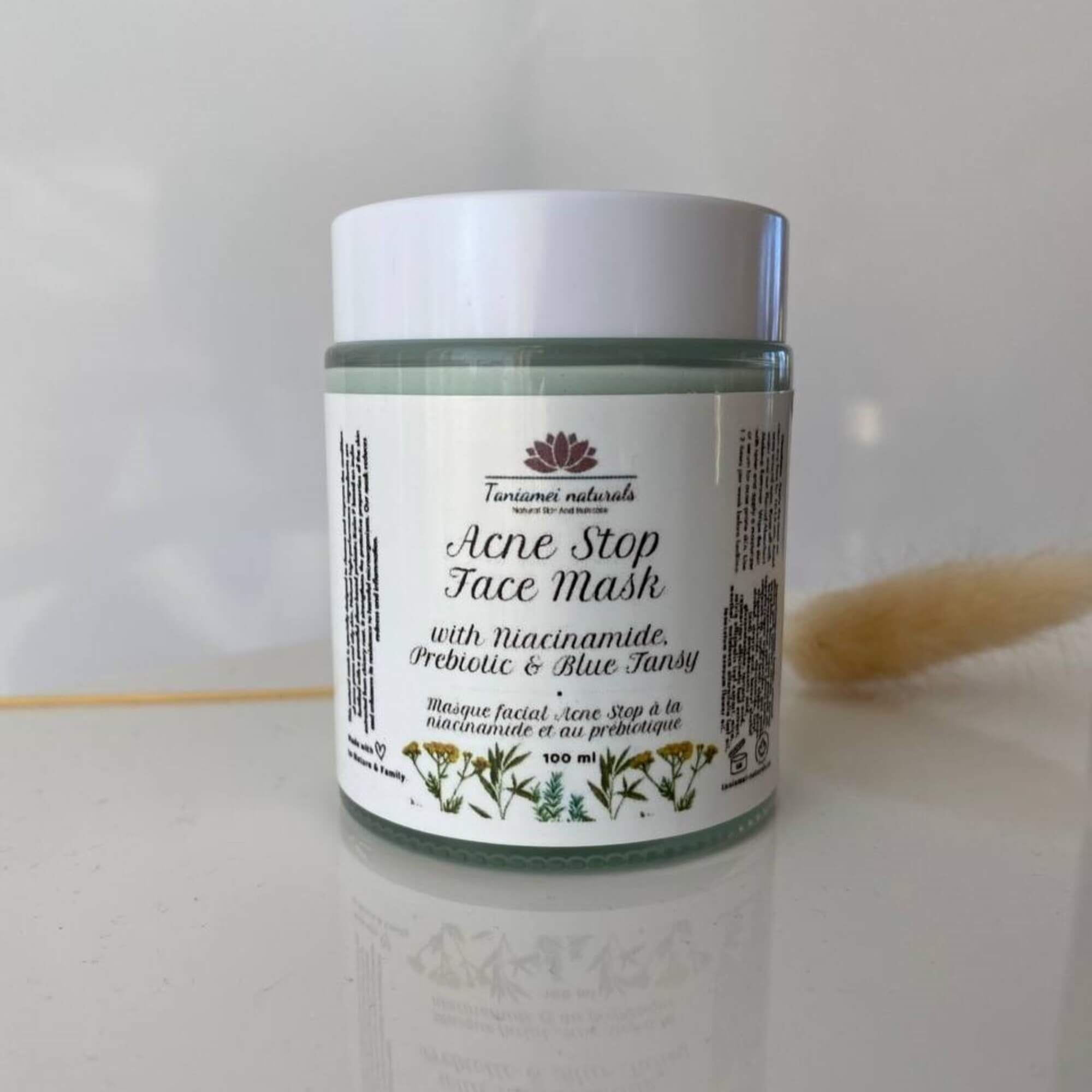glass jar with green face mask