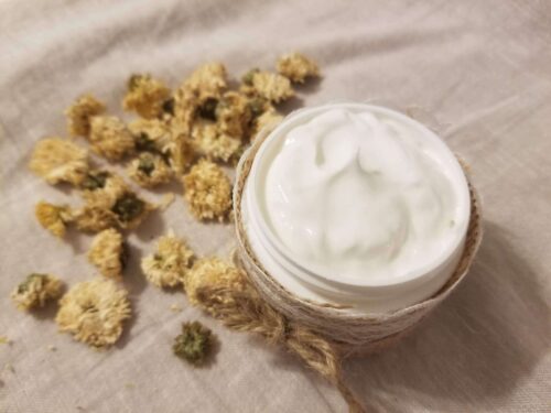 round jar with white lotion