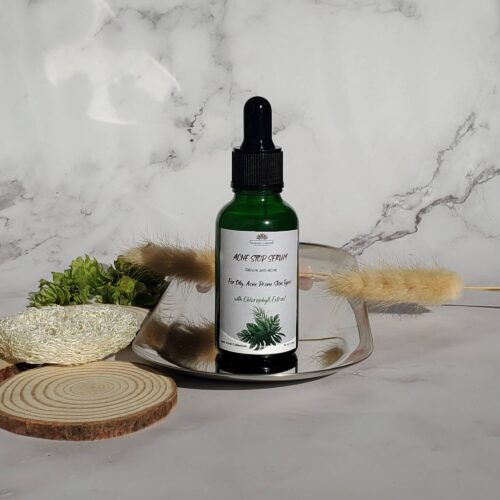 green glass bottle with pipette