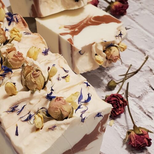 white and pink soap bars with rose buds