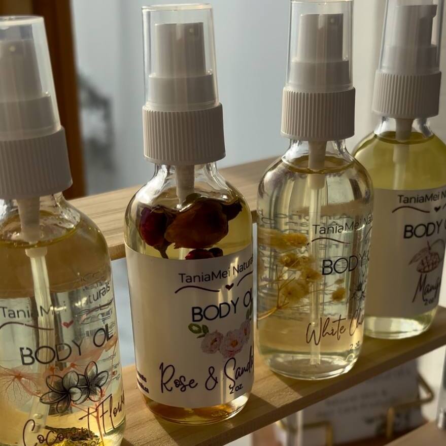 body oil in glass bottle with pump